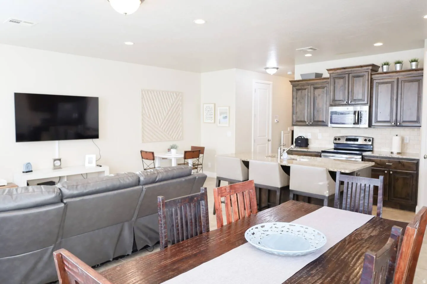 Dining area featuring recessed lighting