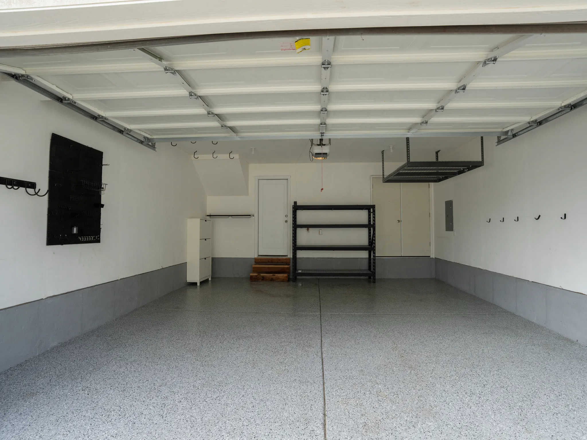 Garage featuring electric panel