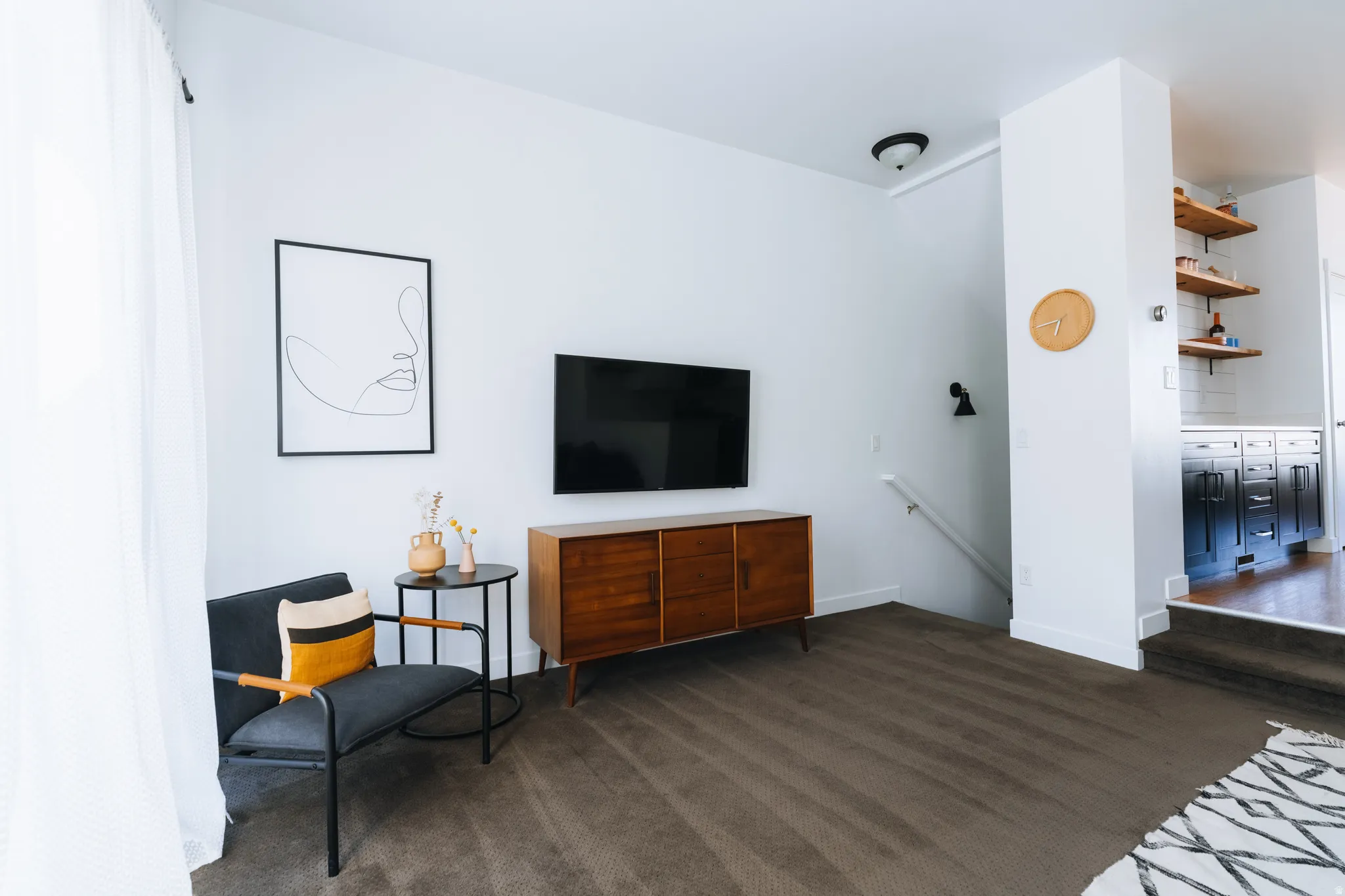 Sitting room featuring an upstairs landing