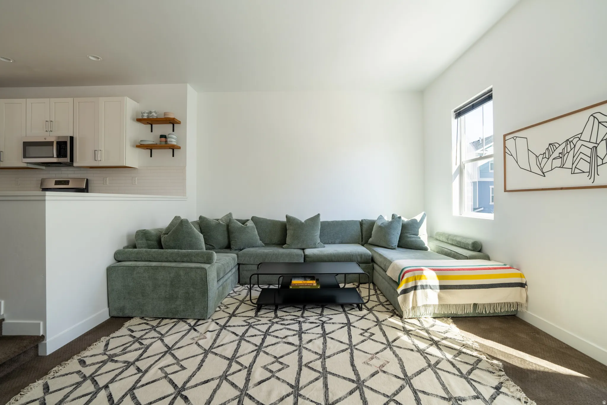 Living room featuring baseboards