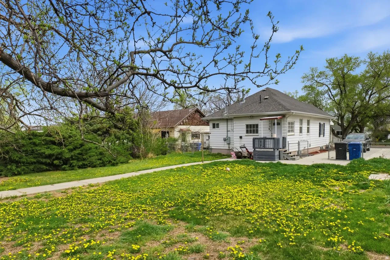 Rear view of property with a patio area