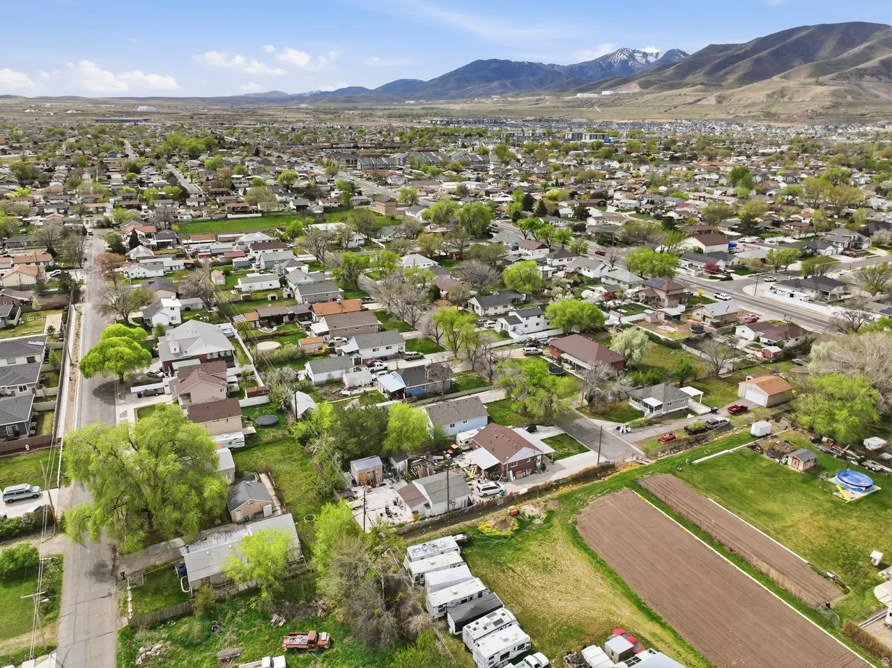 Aerial view of residential area featuring mountains
