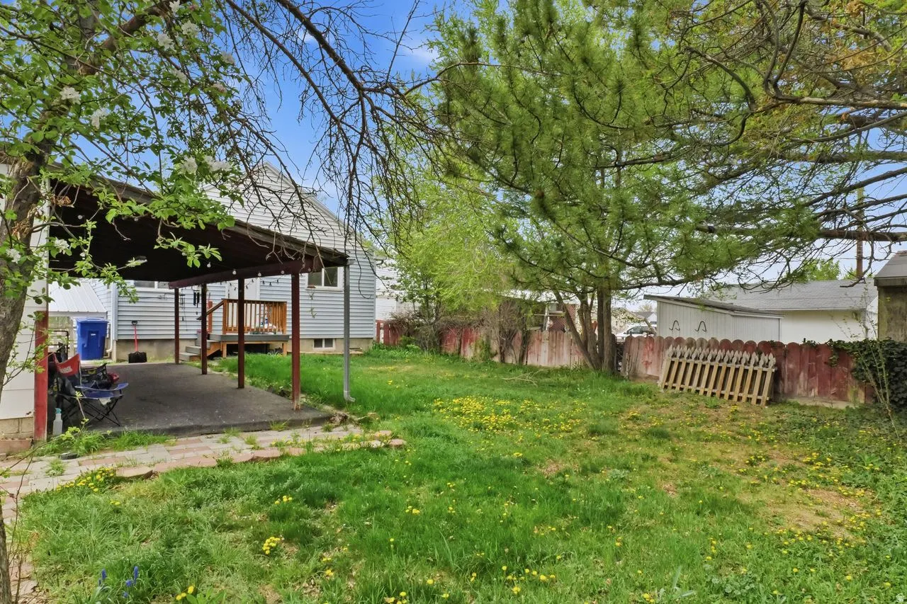View of yard featuring a wooden deck