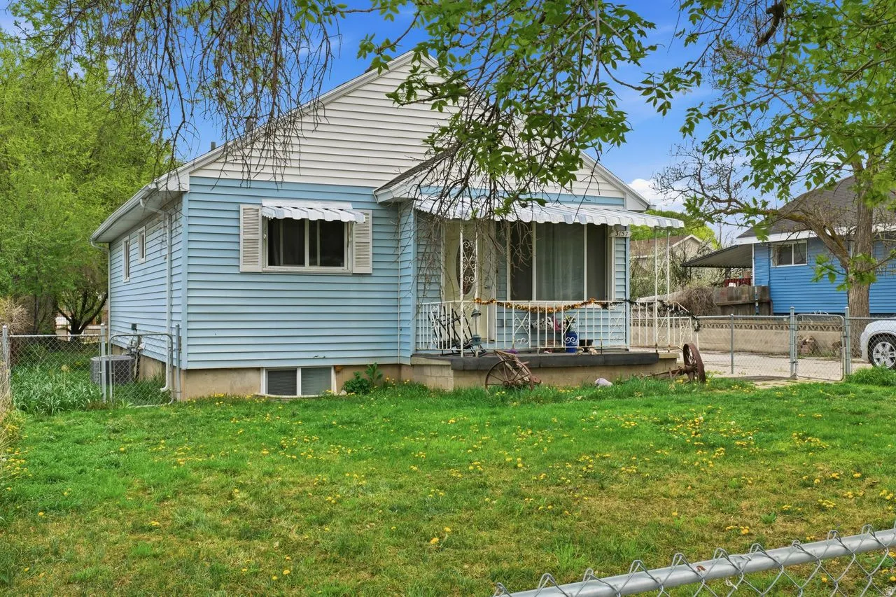 Bungalow with a wooden deck