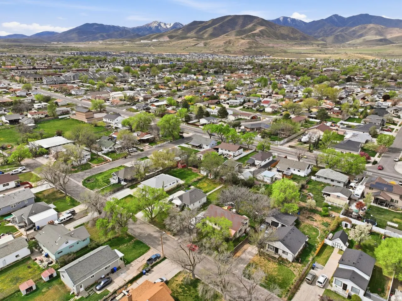 Aerial view of residential area with a mountain backdrop