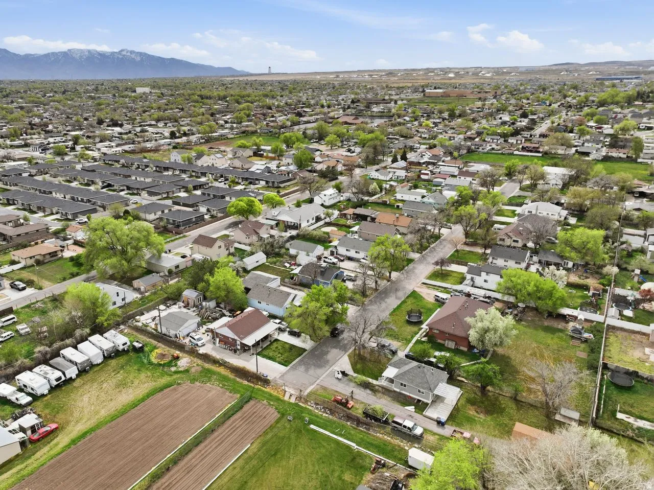 Aerial perspective of suburban area featuring mountains