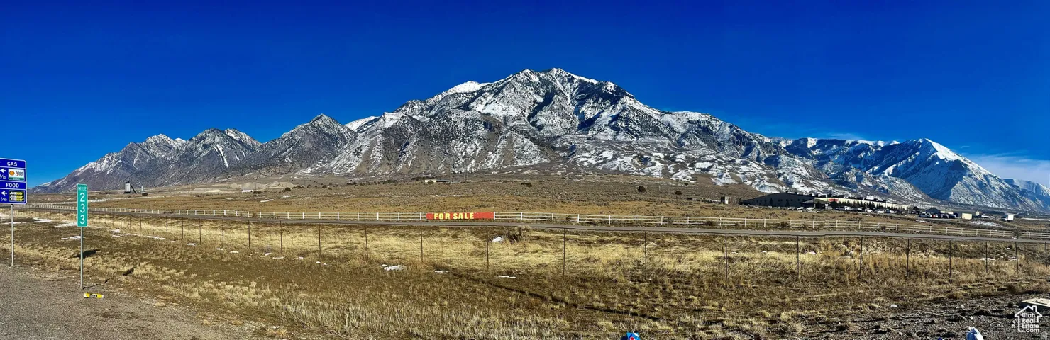 View of mountain background featuring rural landscape