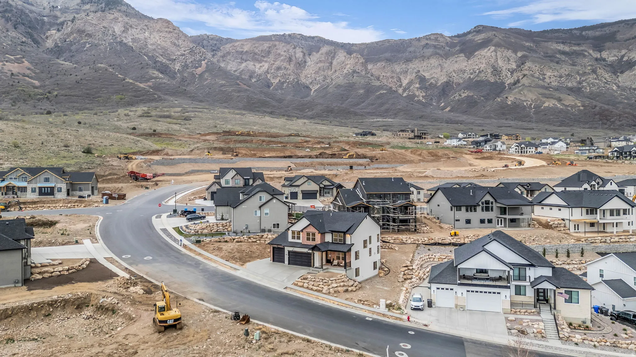View of mountain backdrop with nearby suburban area
