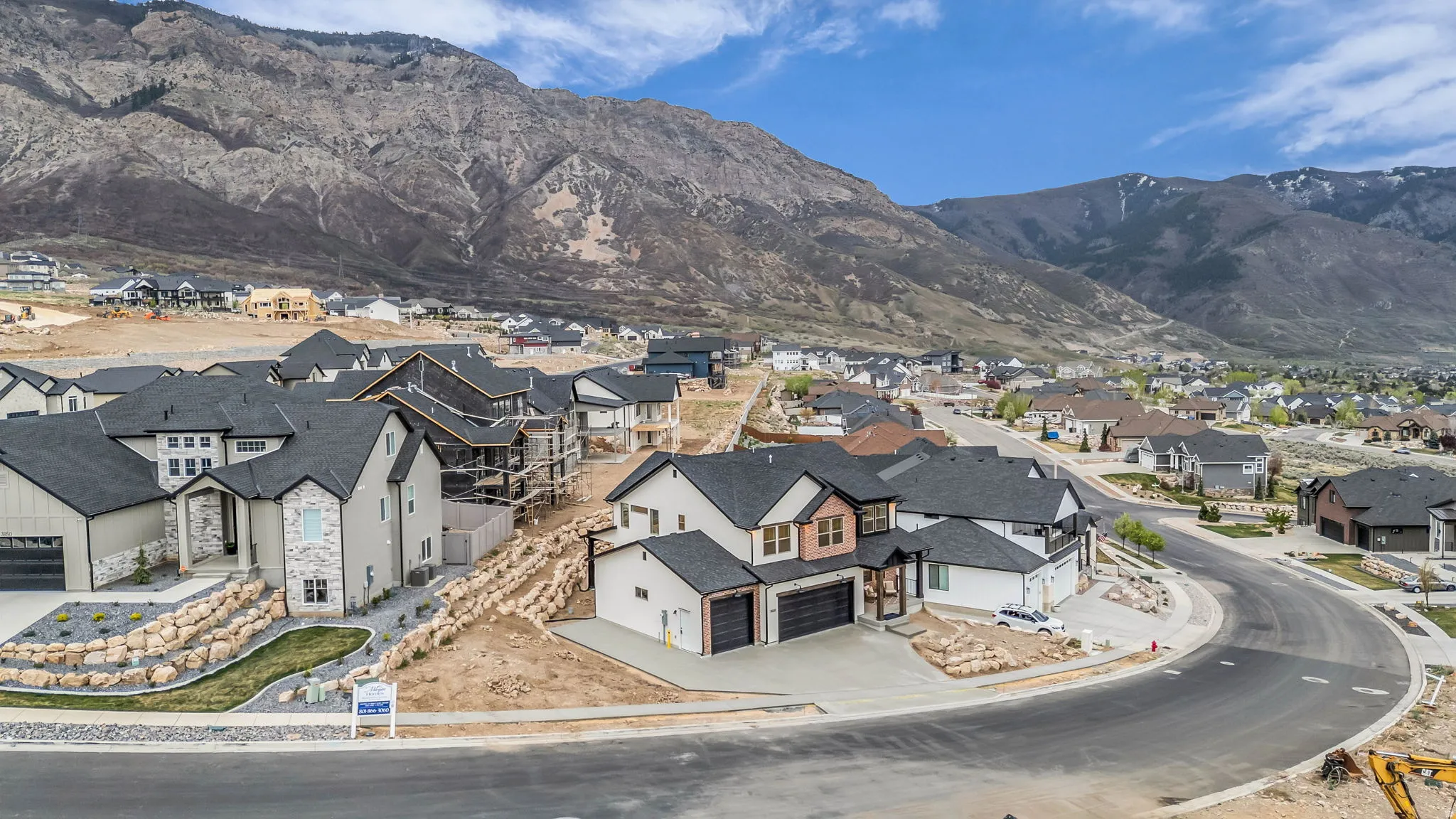 View of mountain backdrop with nearby suburban area
