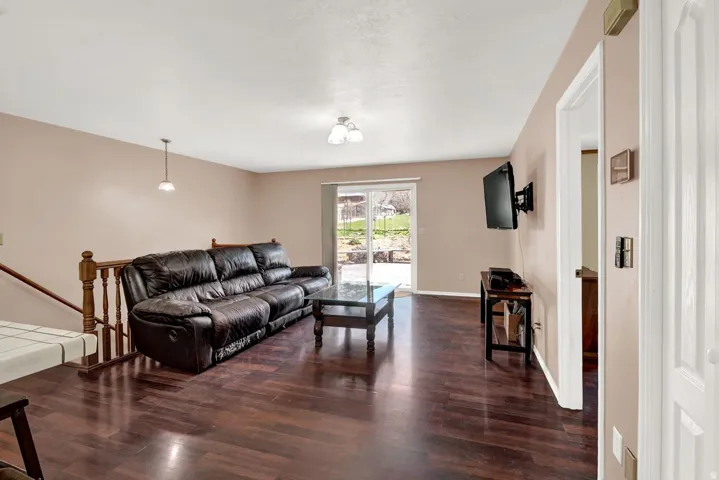 Living room with dark wood finished floors
