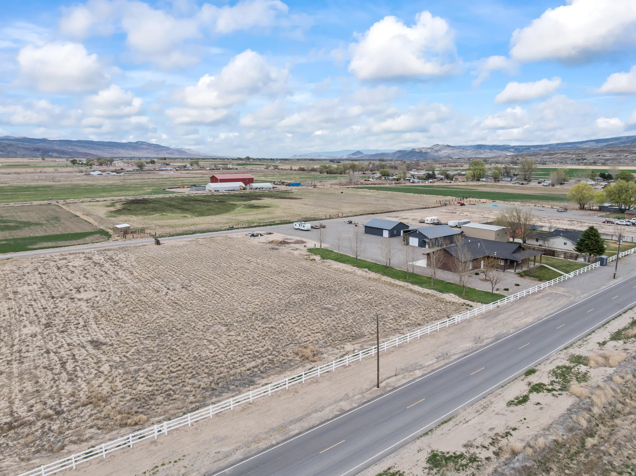 Overview of rural landscape with a mountainous background