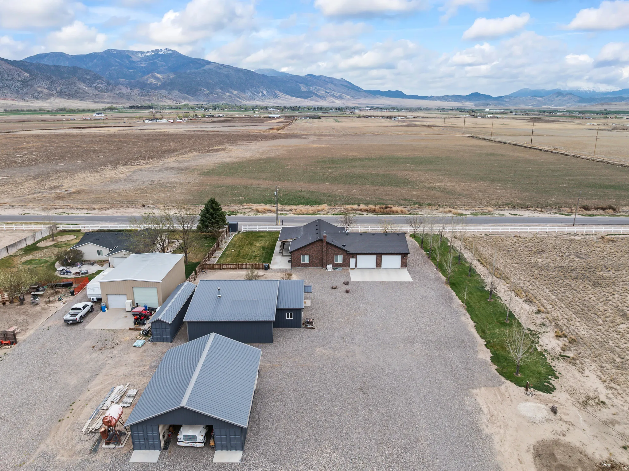 Overview of rural landscape featuring a mountain backdrop