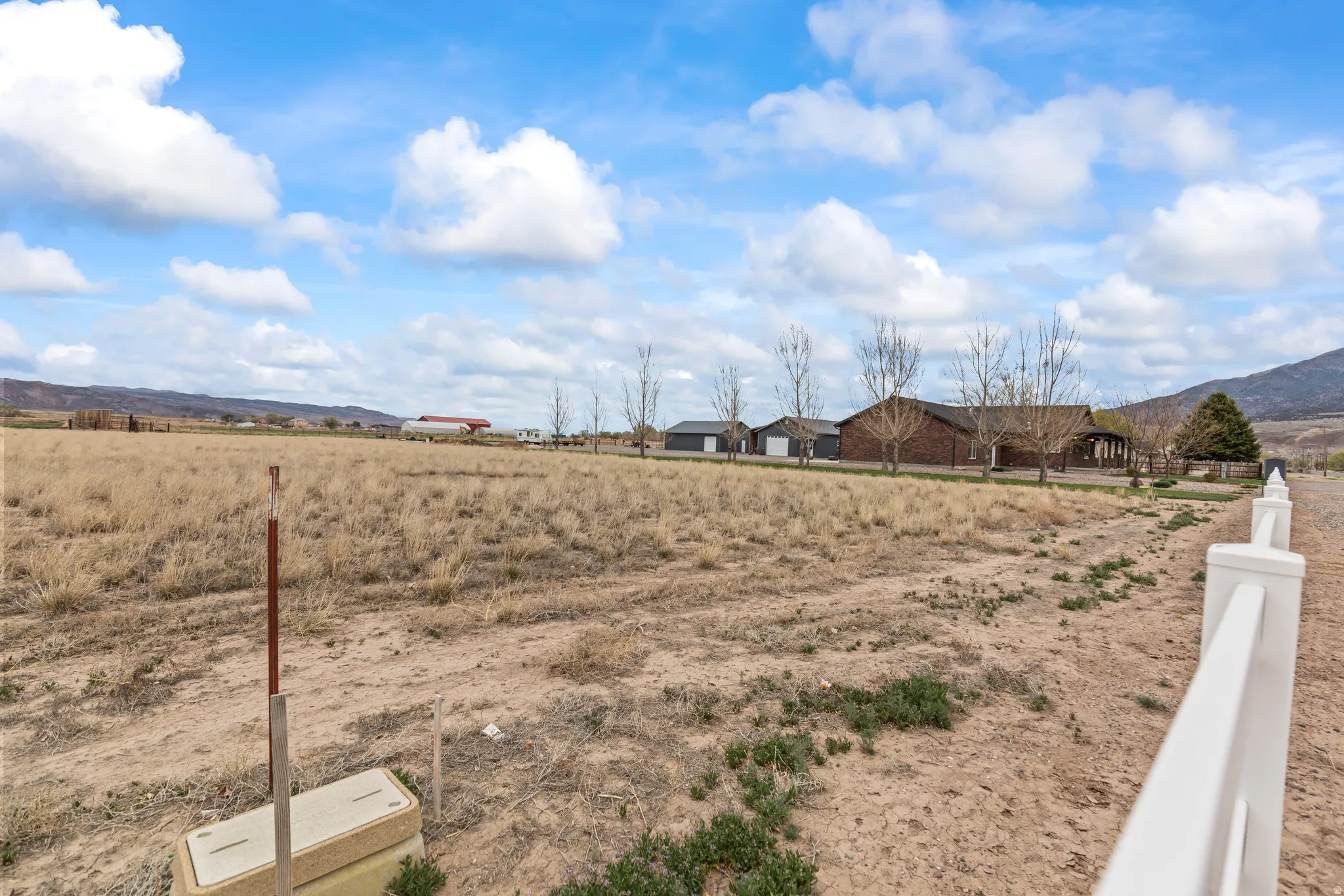 View of yard with a view of countryside and a mountain view
