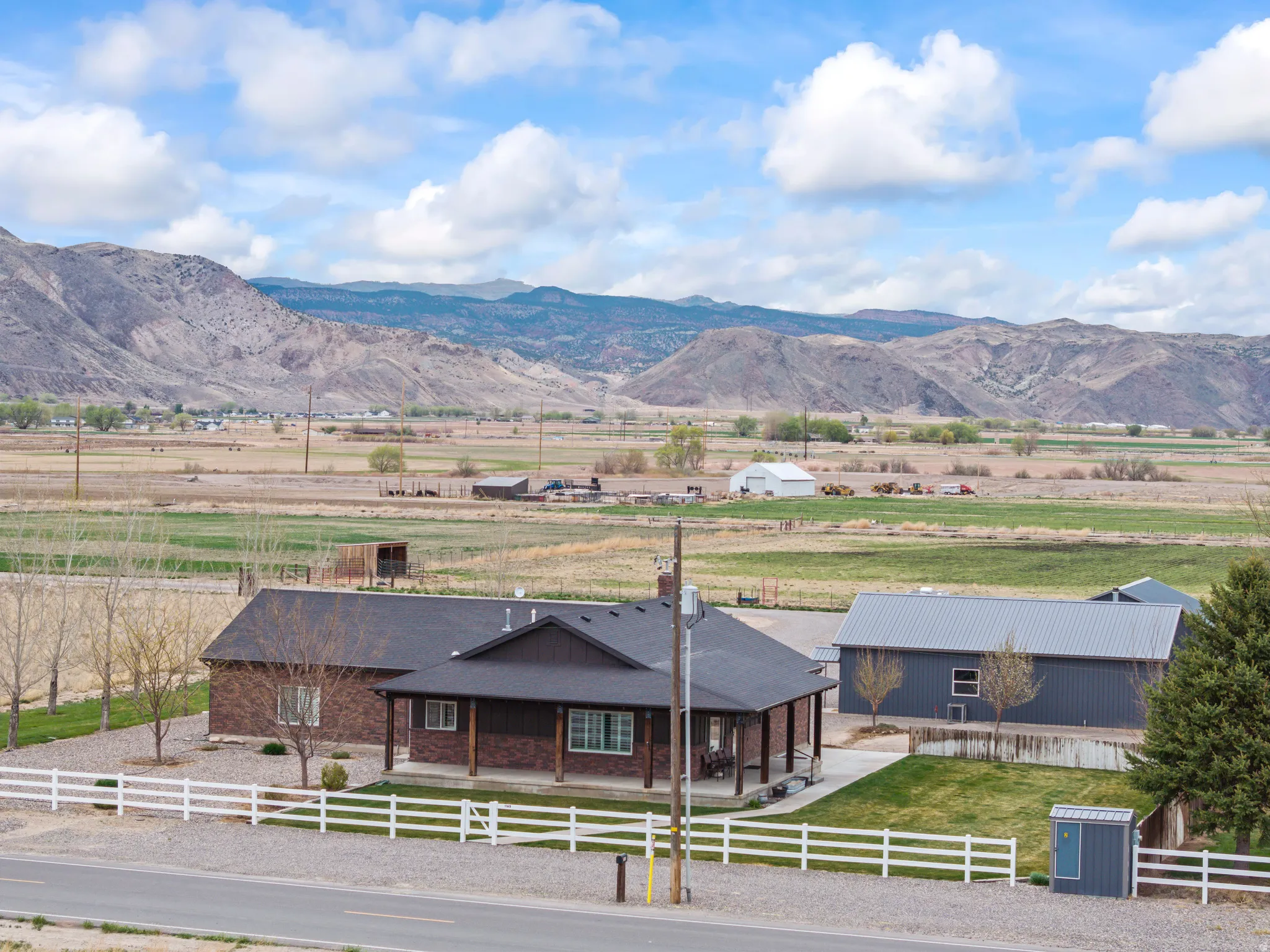 View of mountain background featuring rural landscape