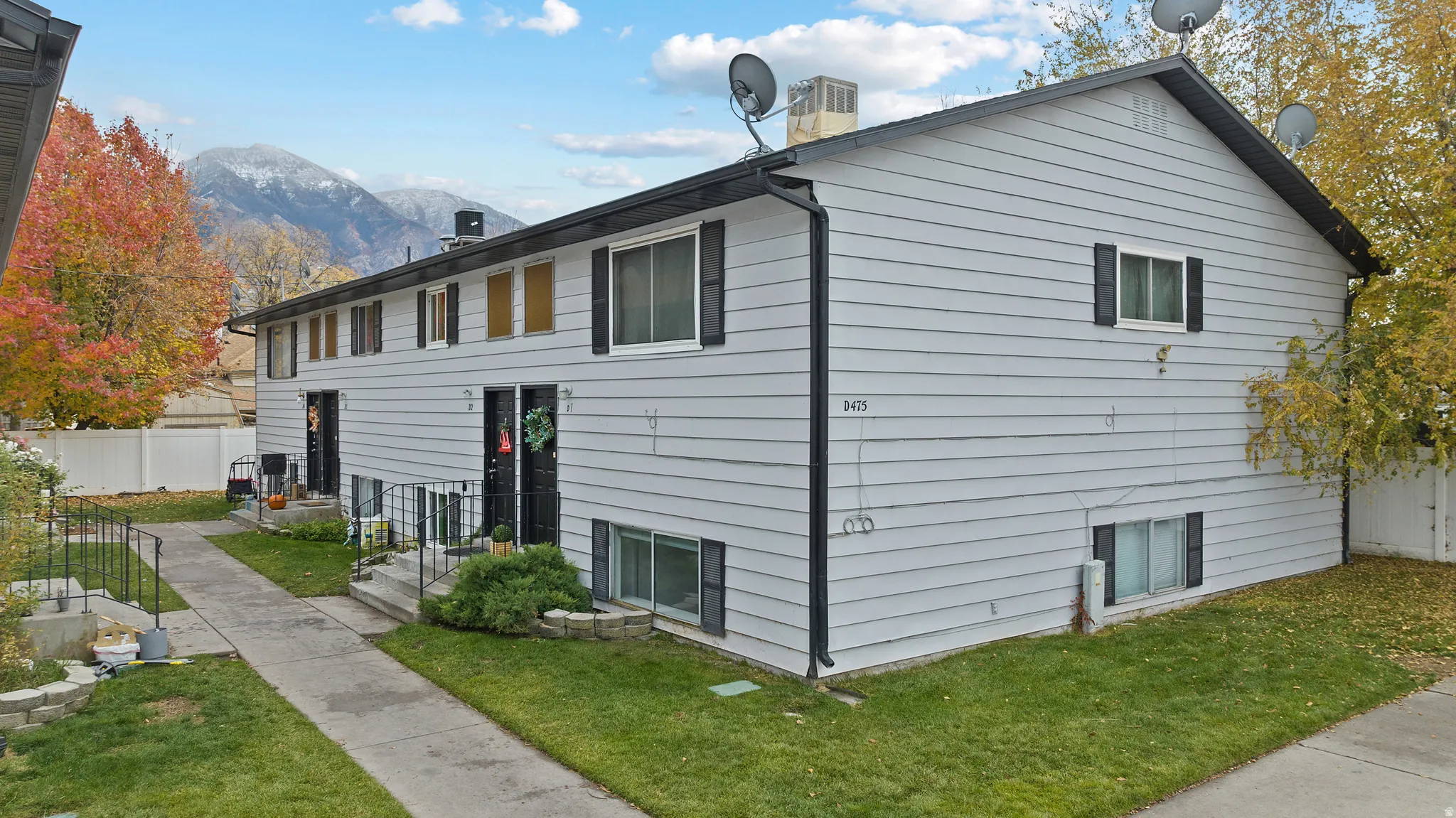 View of home's exterior with a mountain view