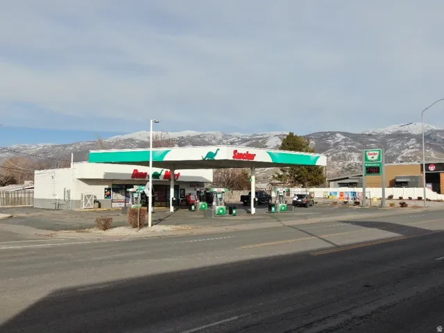 View of commercial property with a mountain view