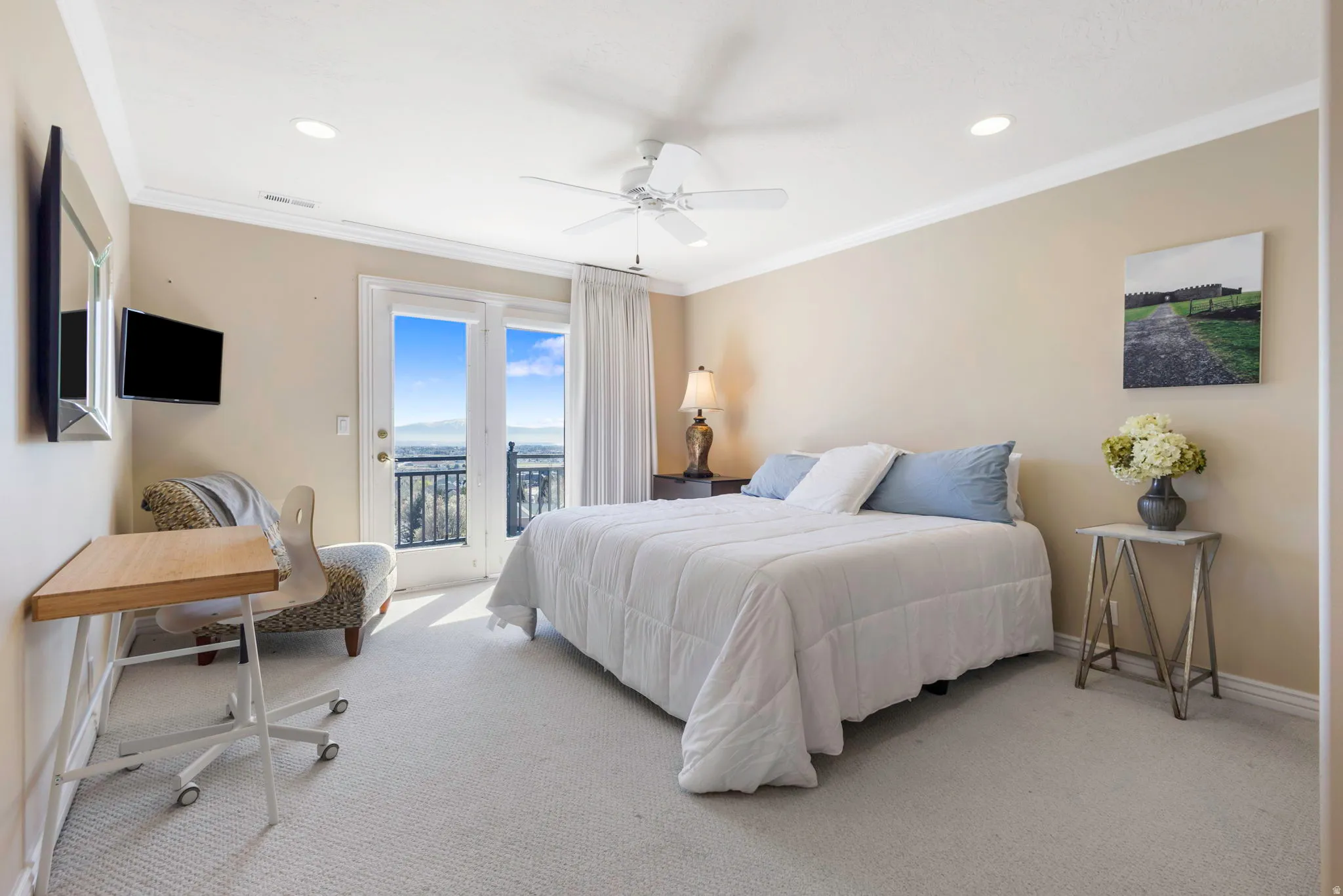 Bedroom with access to exterior, light colored carpet, a ceiling fan, ornamental molding, and recessed lighting