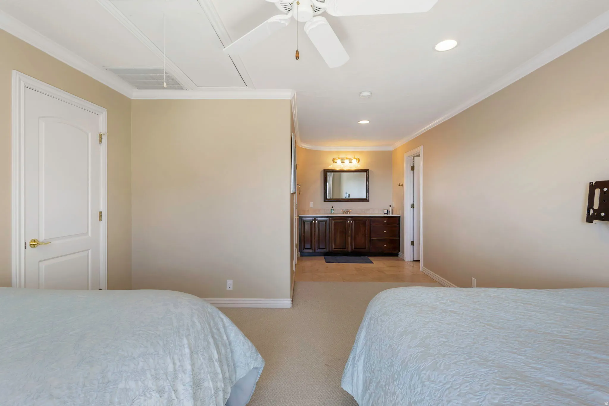Bedroom featuring ornamental molding, light carpet, ceiling fan, and recessed lighting