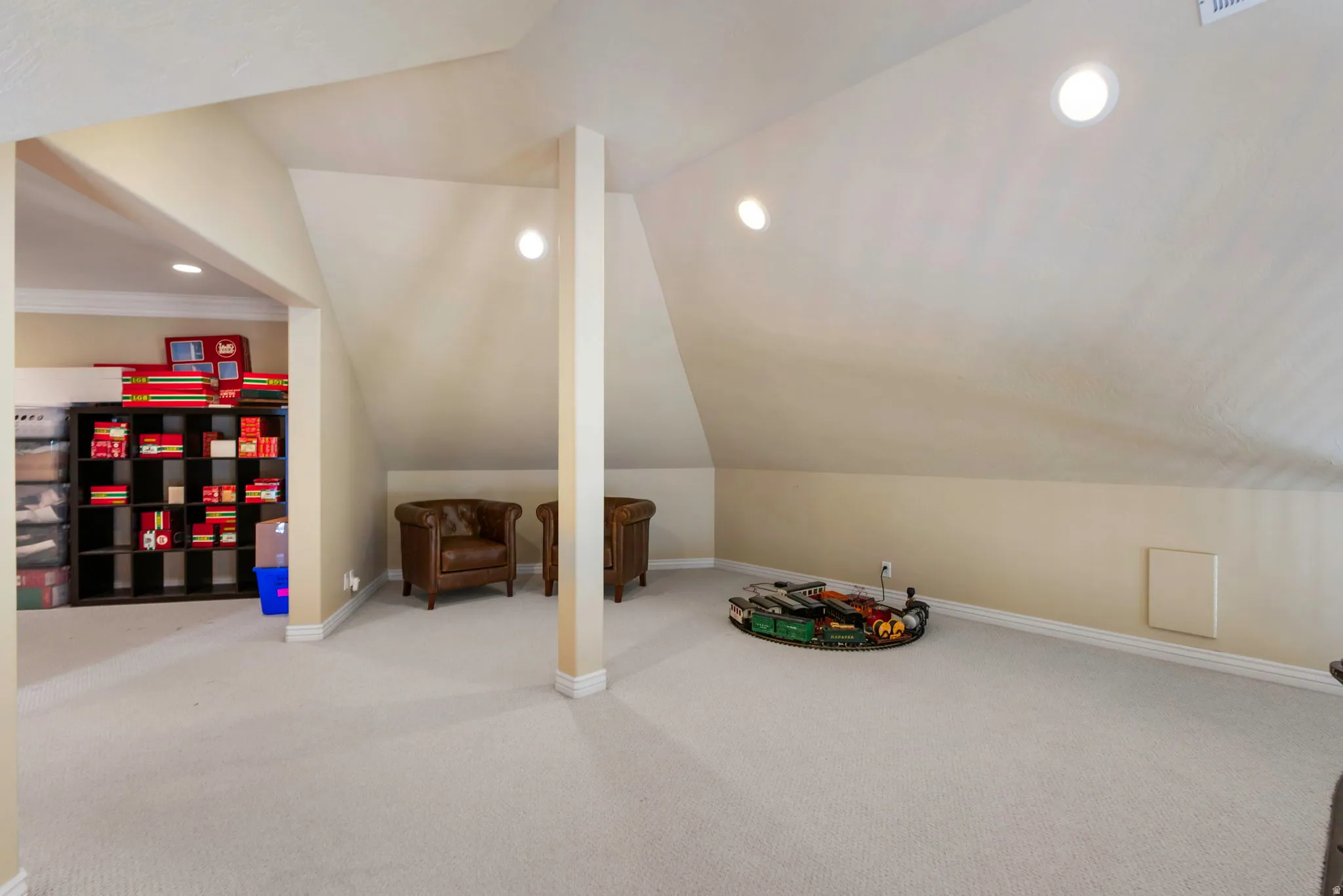 Game room featuring light colored carpet, recessed lighting, and vaulted ceiling