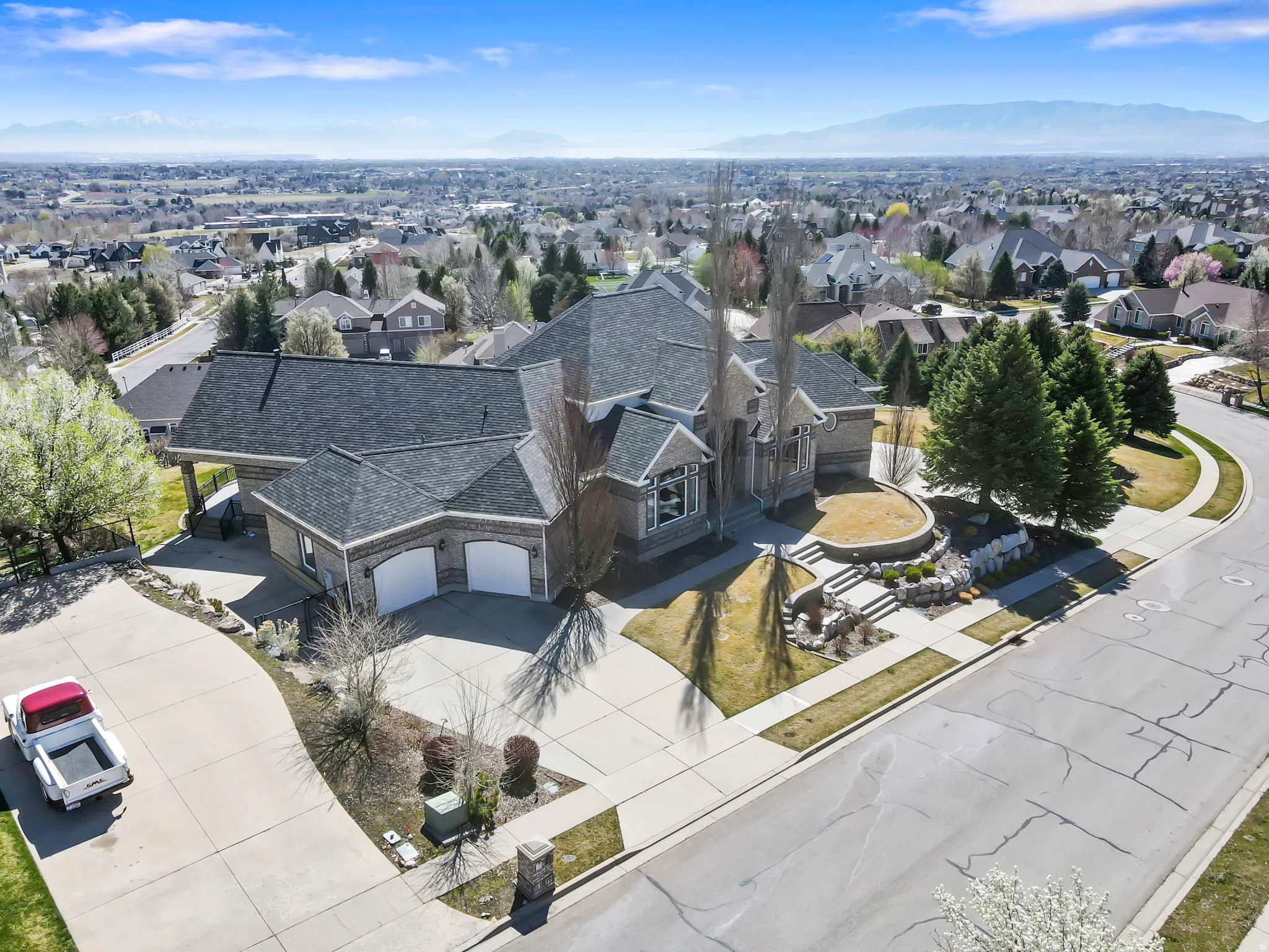 Aerial perspective of suburban area featuring mountains
