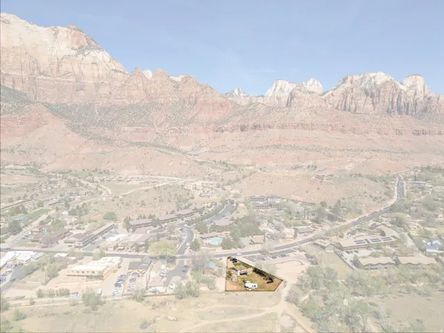 View of mountain background featuring nearby suburban area