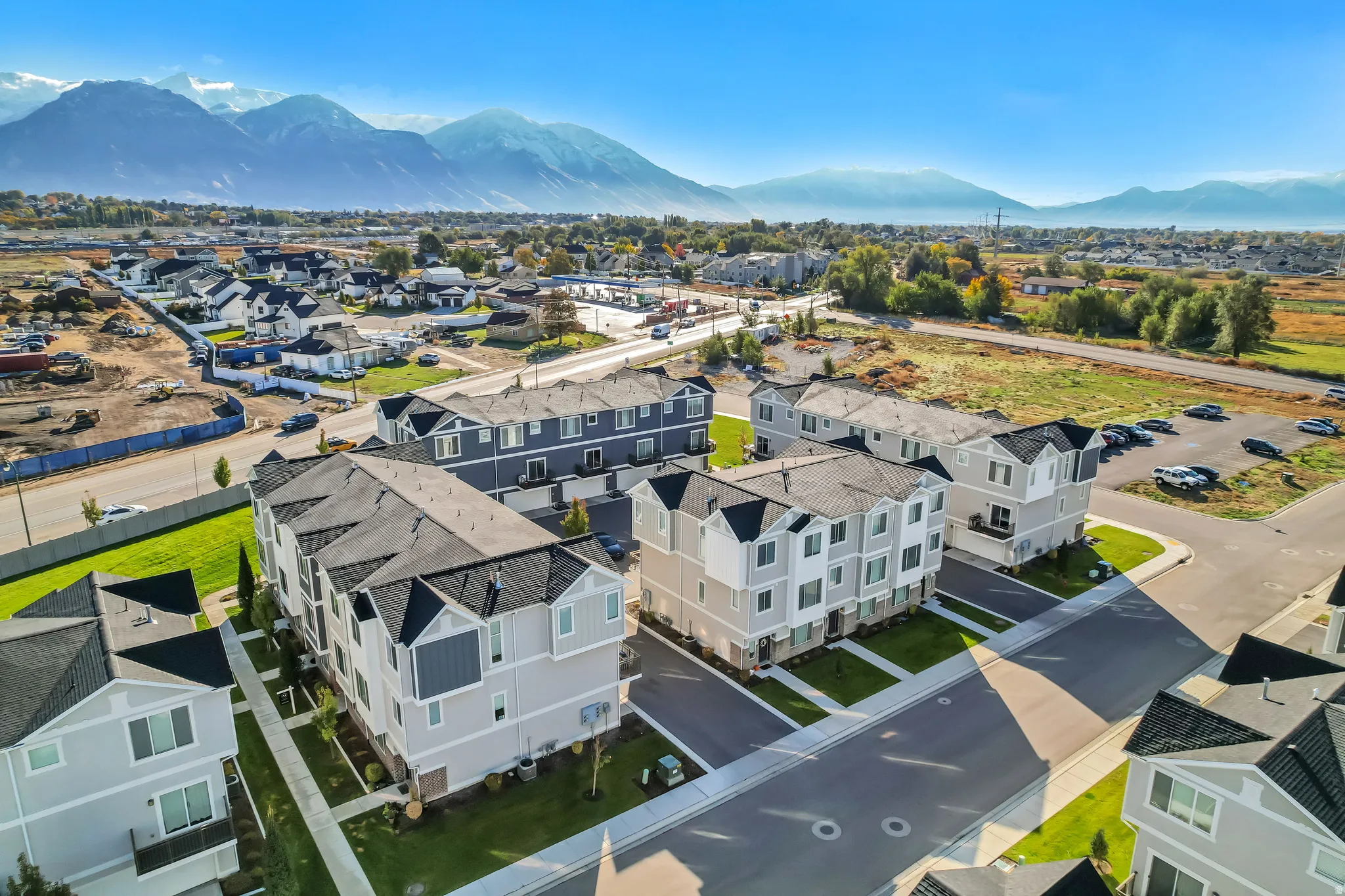 Aerial view of residential area featuring mountains