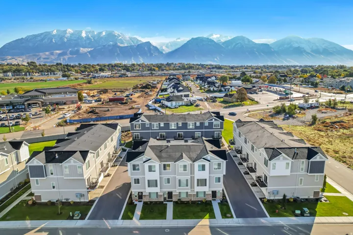 Aerial view of residential are with mountainous background