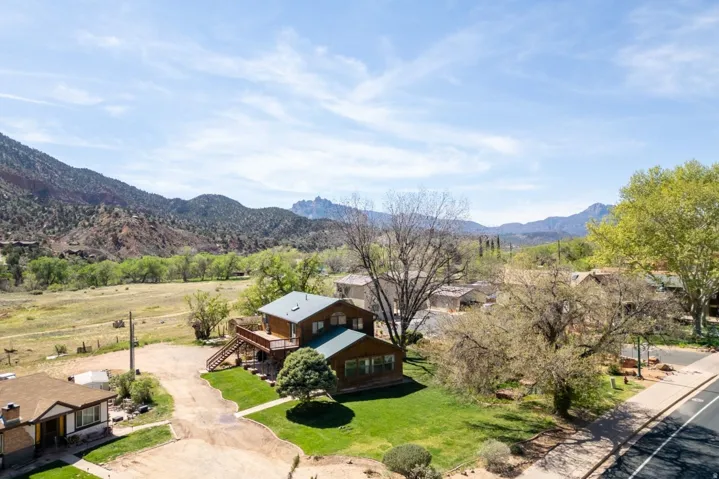 Aerial view of residential area with a mountain backdrop