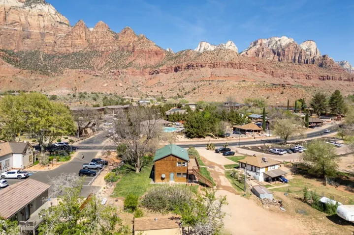 Aerial view of residential area with a mountainous background
