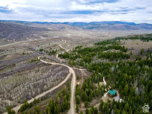 Overview of rural landscape featuring a mountainous background