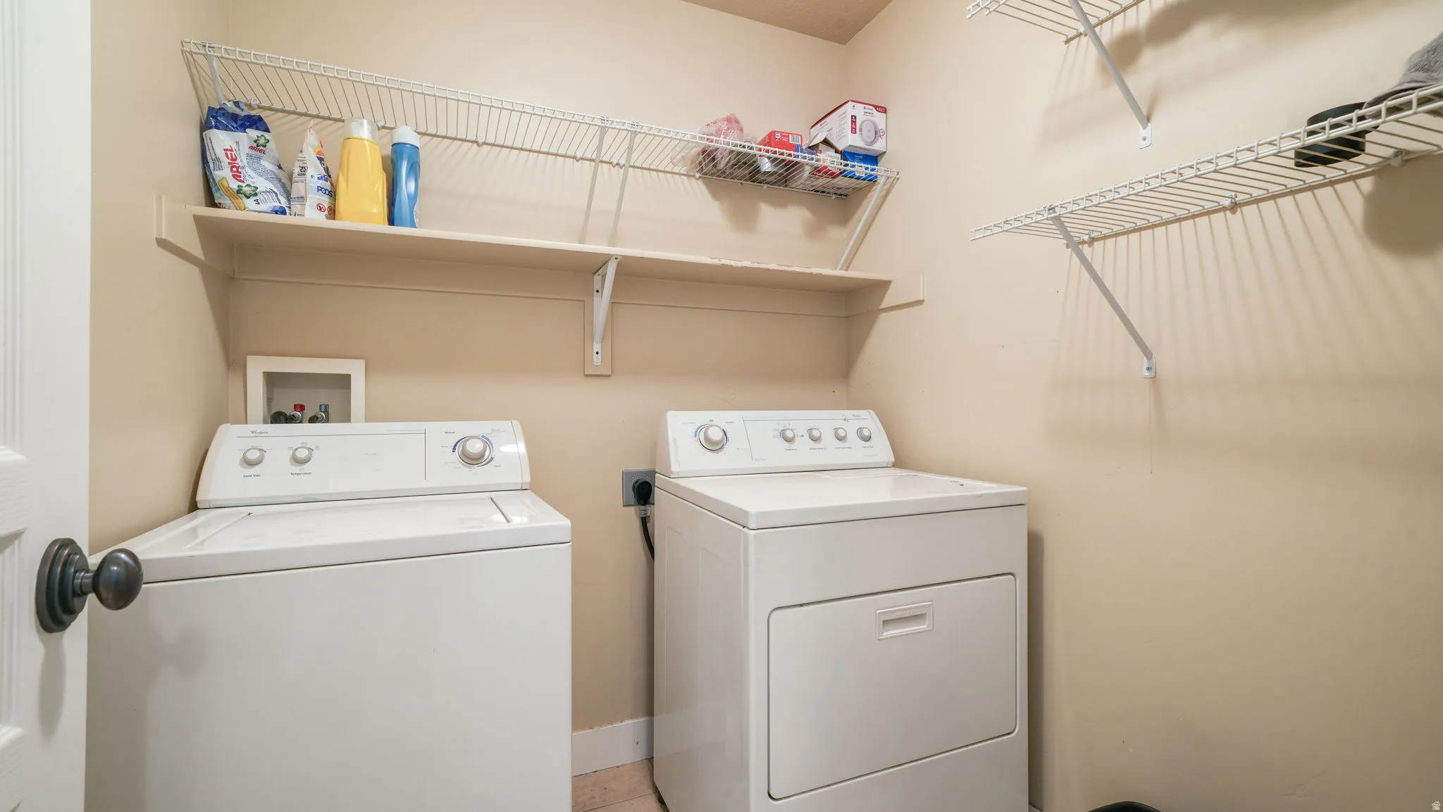 Laundry area featuring washer and clothes dryer