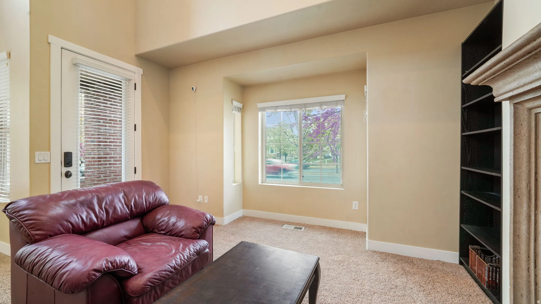 Living room with light carpet