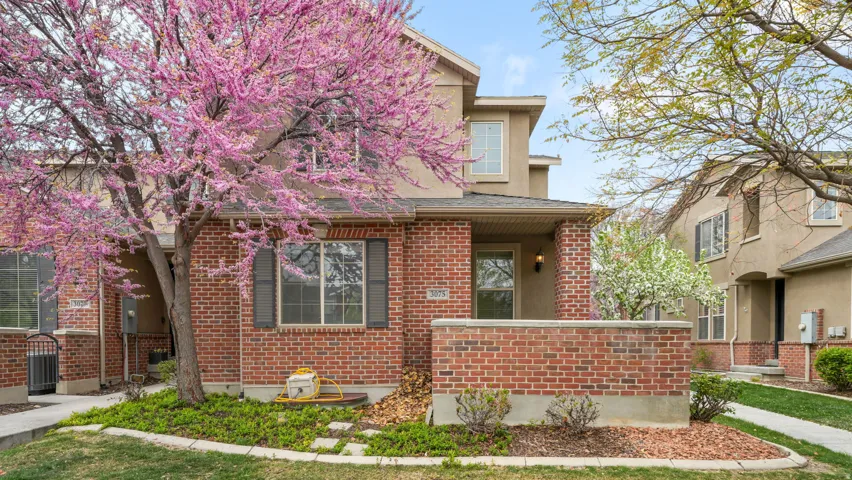 View of front of property featuring brick siding