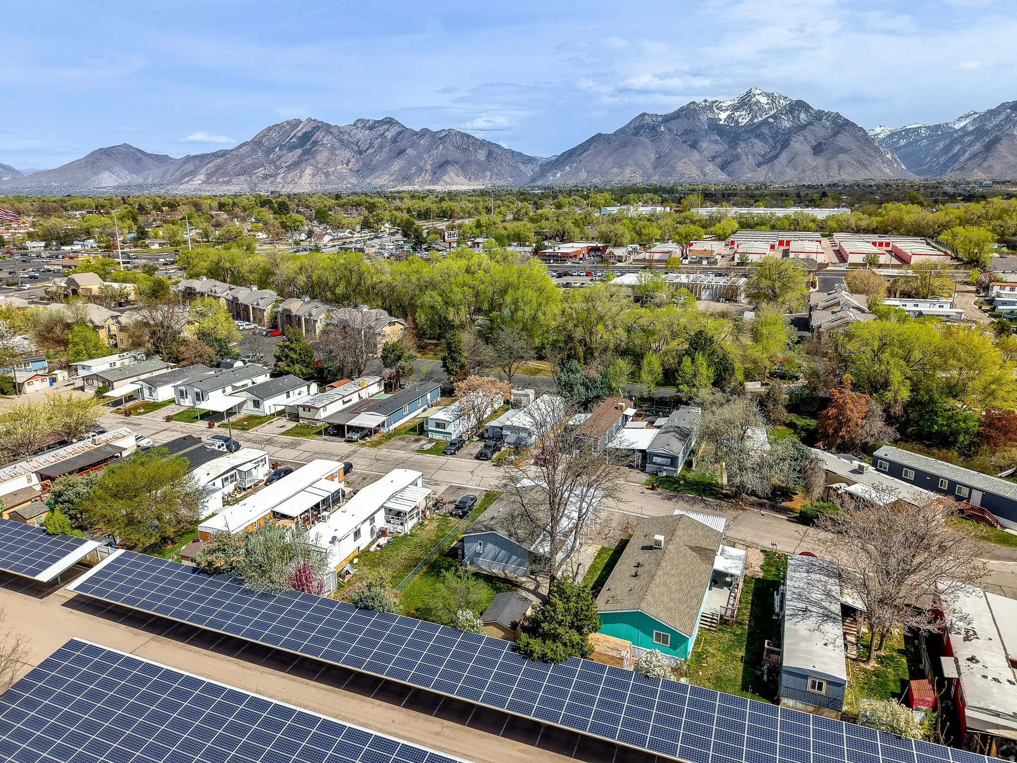 Aerial view of residential area with a mountainous background