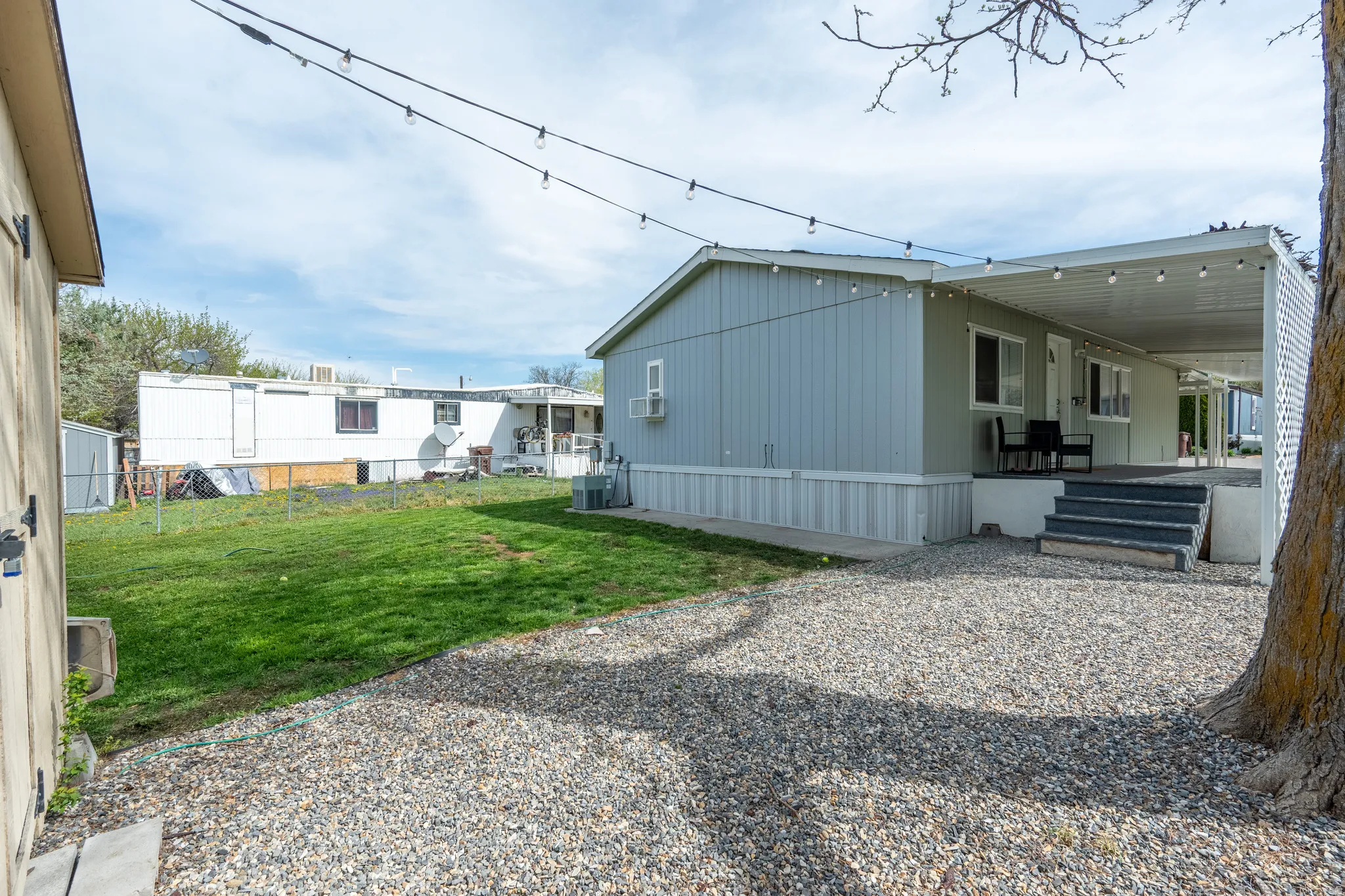 View of side of property with a patio area