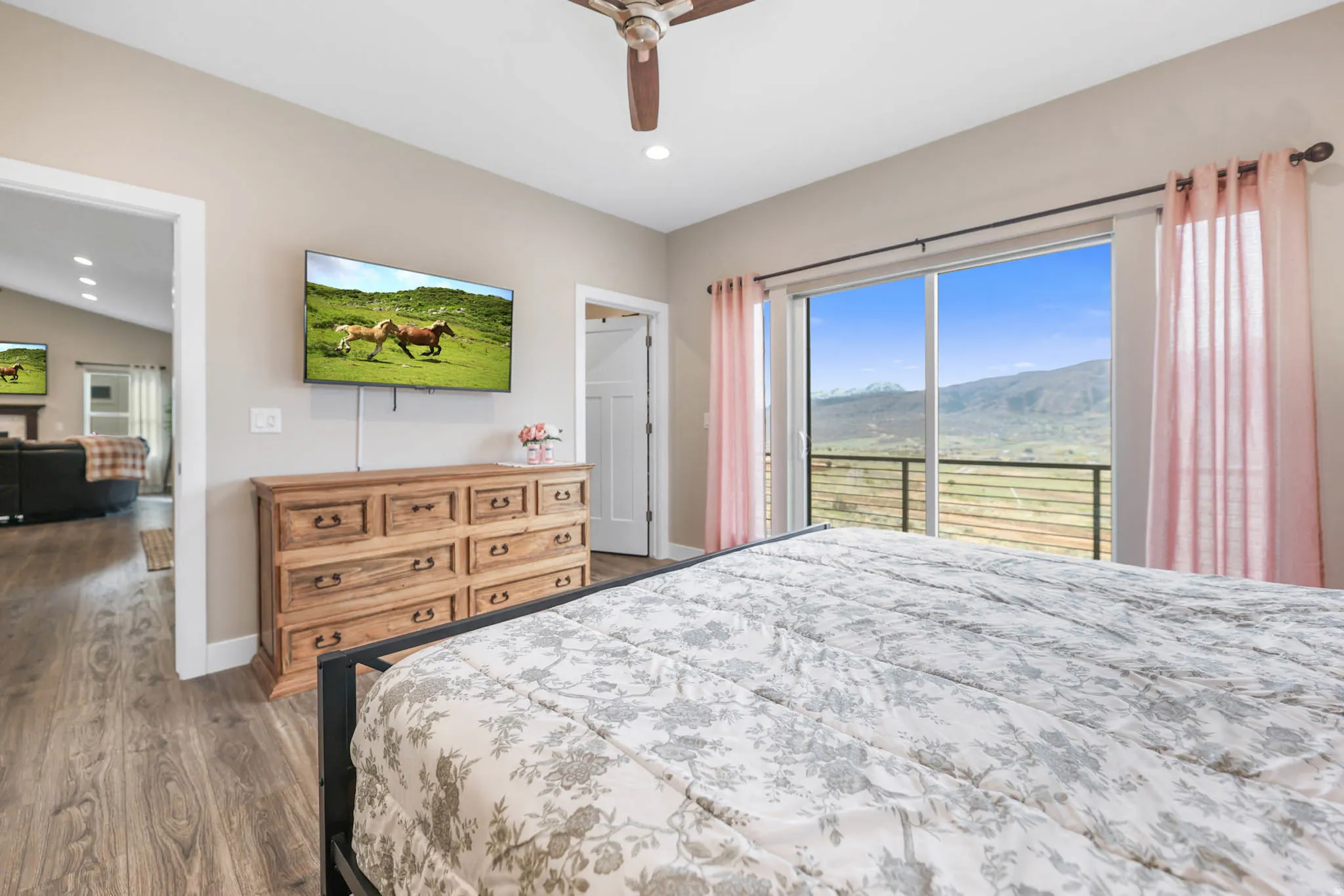 Bedroom featuring access to exterior, dark wood-style flooring, recessed lighting, and ceiling fan