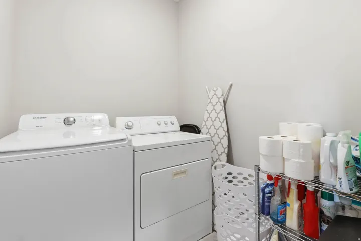 Laundry area featuring separate washer and dryer