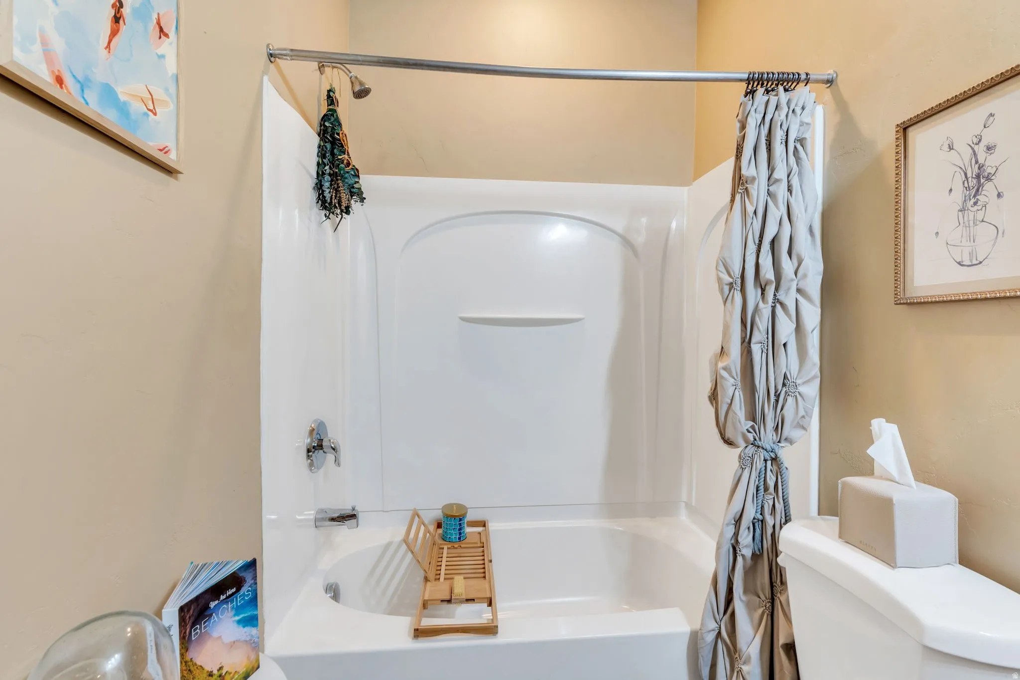 Full bathroom featuring toilet and shower / tub combo