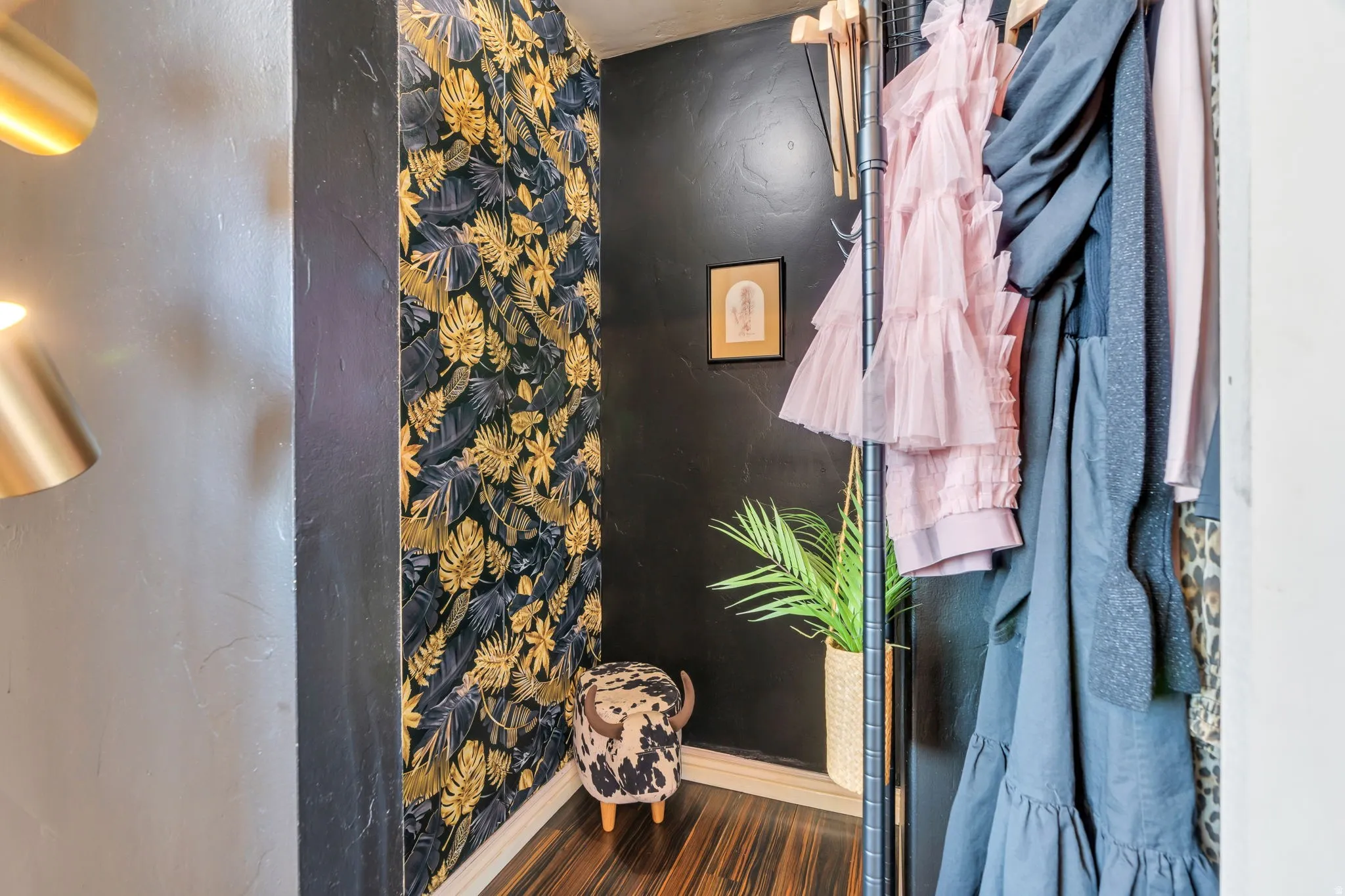 Full bathroom featuring a stall shower and dark wood finished floors