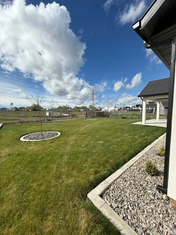 Fenced yard with a patio