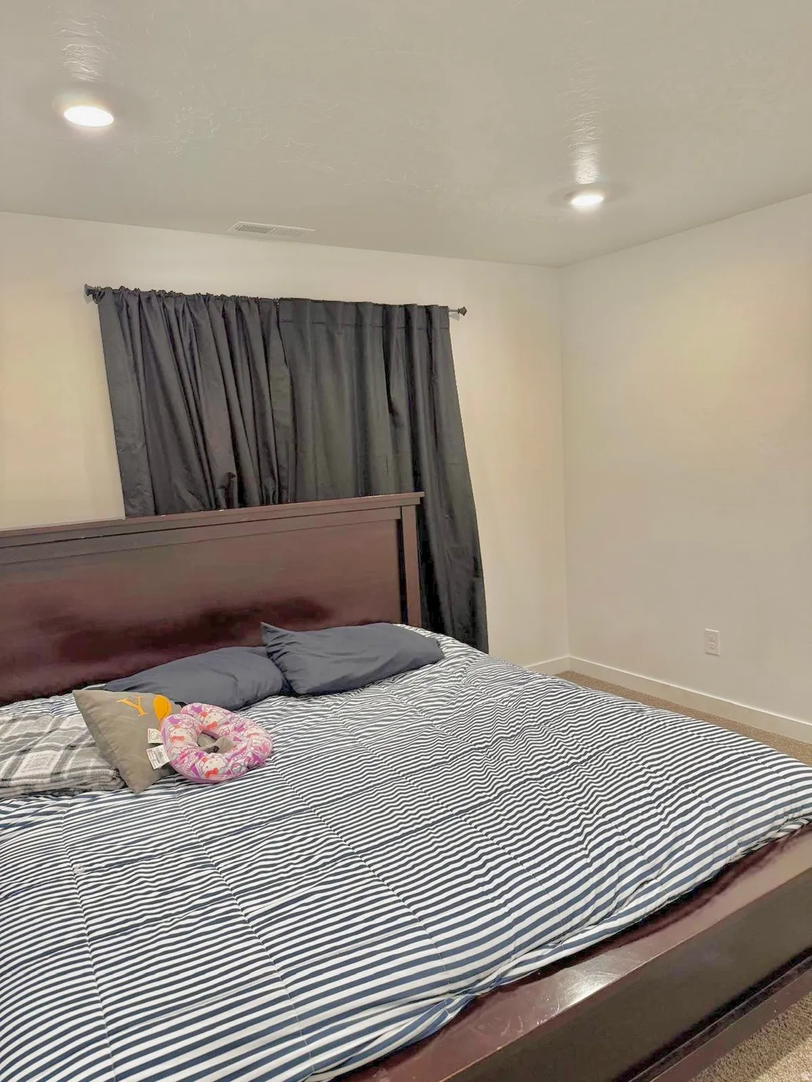 Bedroom featuring baseboards and recessed lighting