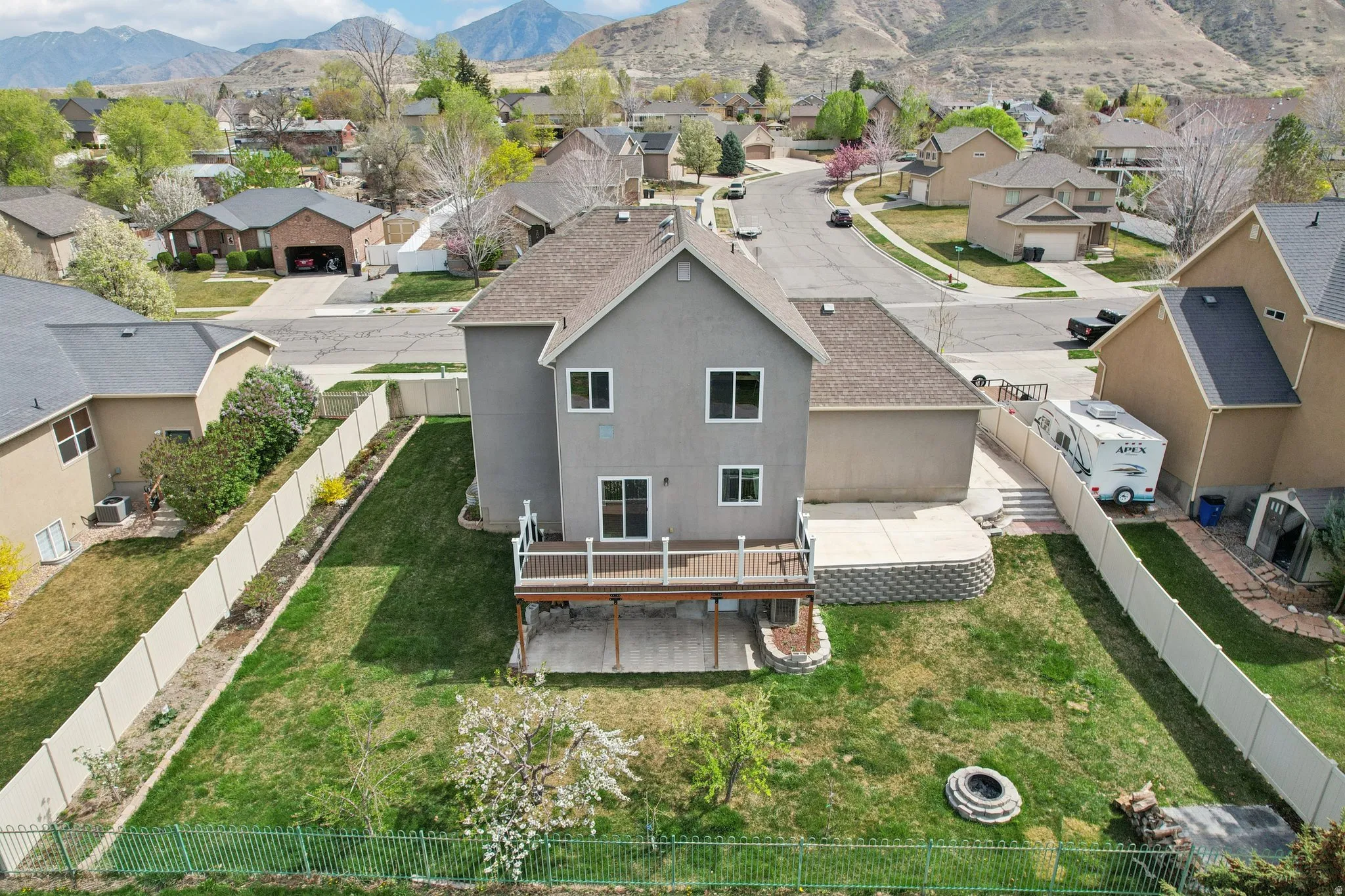 Aerial view of residential area featuring mountains