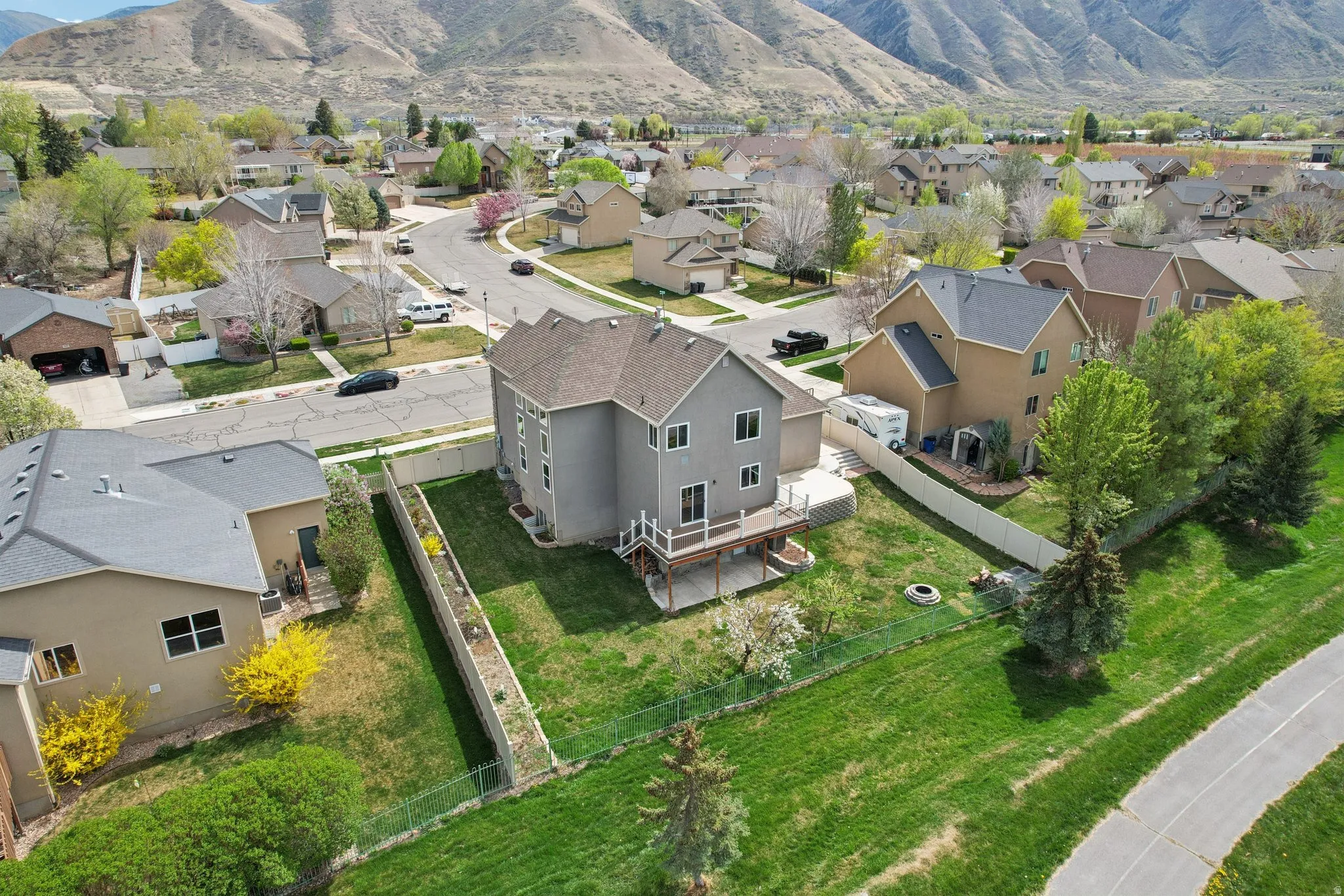 Aerial view of residential area featuring mountains