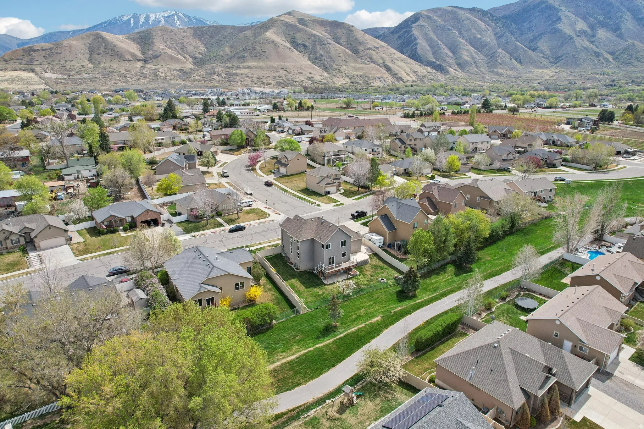 Aerial perspective of suburban area with mountains