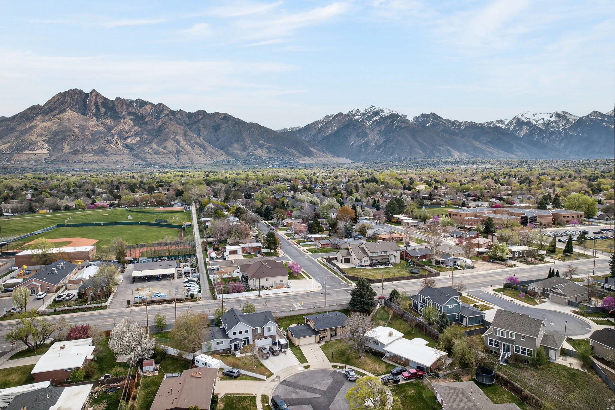 Aerial perspective of suburban area featuring mountains