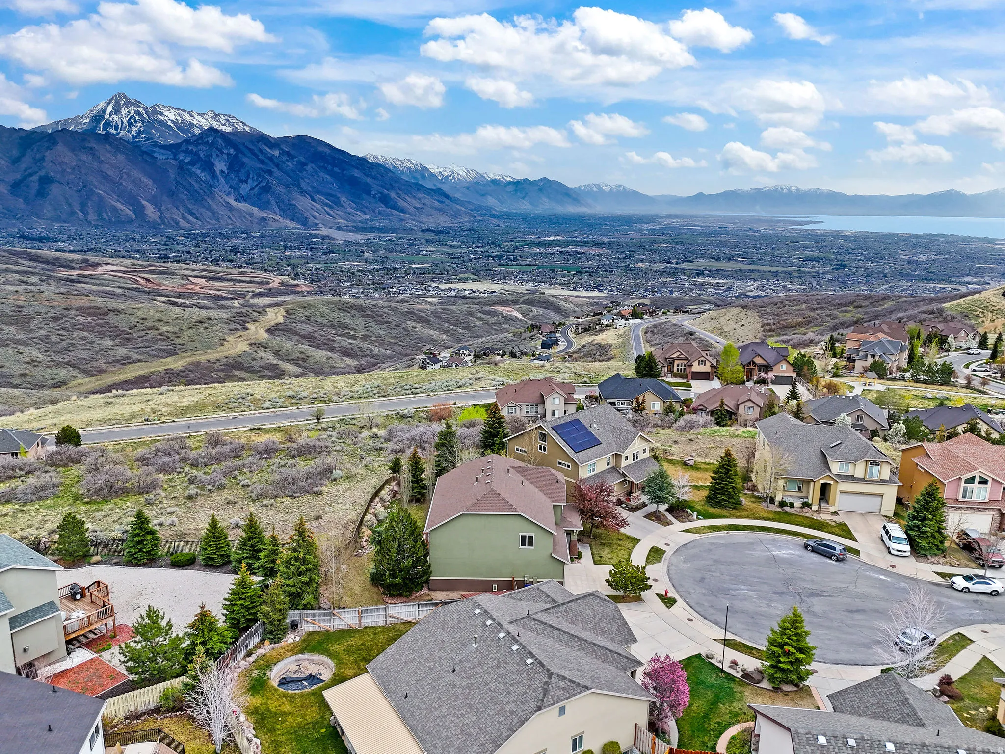Aerial view of residential area with a mountainous background