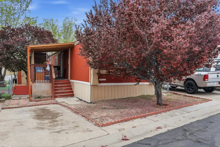 View of front of house with a gate and covered porch