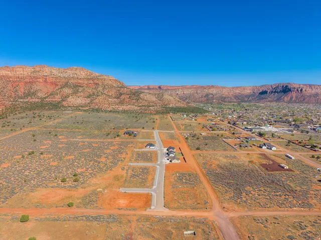 Overview of rural landscape featuring mountains and a desert landscape