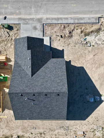 Asphalt shingle roofing with multiple gables and vents