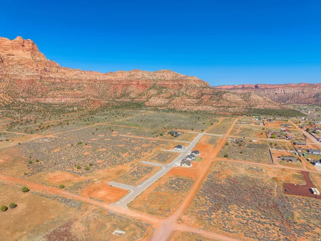 View of mountain backdrop with a desert landscape and rural landscape